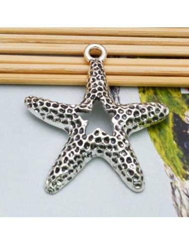 Ciondolo stella marina vuota martellata metallo argento 43x50 mm 1pz Gioie d'Oriente
