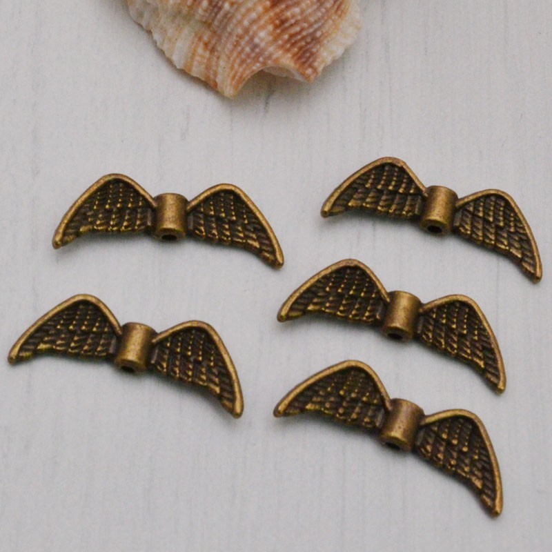 Distanziatori ali in metallo argento 8 x 22 mm 6pz Gioie d'Oriente