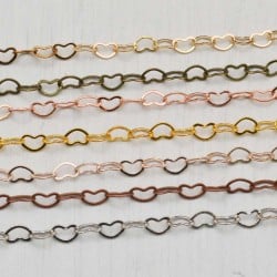 Catena maglia cuore in ottone anelli piatti saldati 3 x 4.2 mm 1 mt Gioie d'Oriente