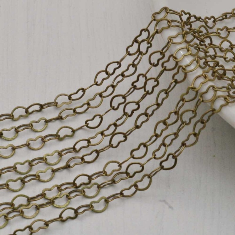 Catena maglia cuore in ottone anelli piatti saldati 3 x 4.2 mm 1 mt Gioie d'Oriente