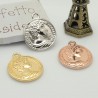 Ciondolo medaglia moneta in ottone 12x15 mm 1pz Gioie d'Oriente