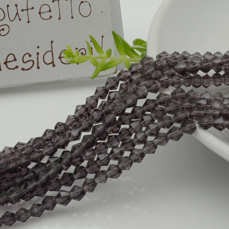 Filo di Cristalli Bicono sfaccettati Viola scuro di 4.5mm circa 110pz | GDO