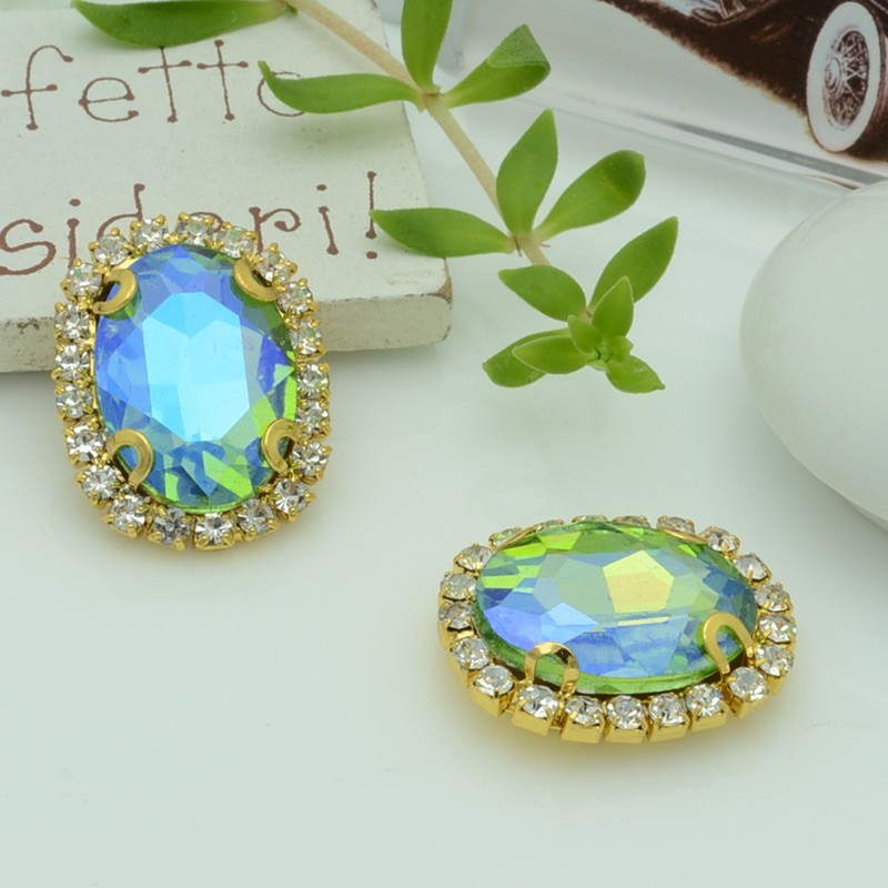 Cristallo in vetro colore Azzurro acqua AB incastonato con base oro con strass 18x22mm 1pz | GDO