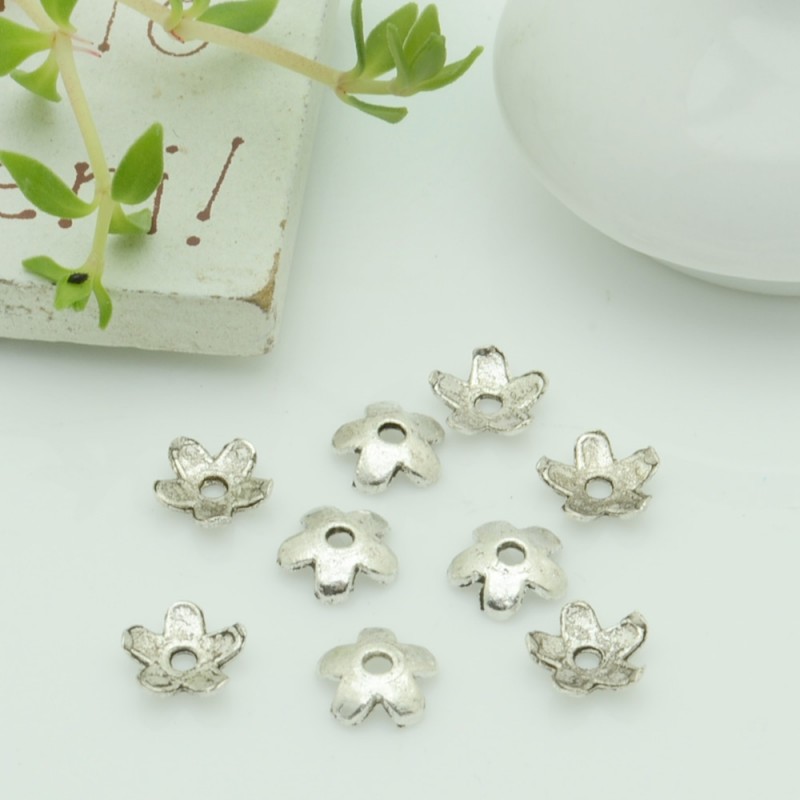 Copri perla fiorellino 6.5 mm col argento 40 pz per le tue creazioni