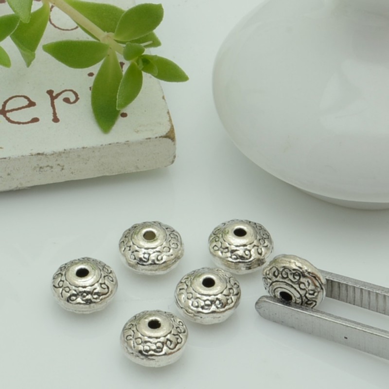Distanziatori Perline con fantasia 6.8 x 4 mm 11 pz in metallo per bigiotteria per le tue creazioni!