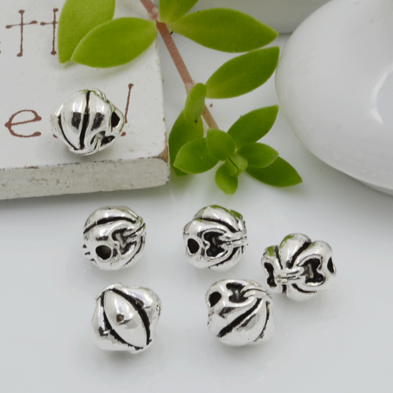 Distanziatori Perline con fantasia fiocco 7 mm 6 pz in metallo per bigiotteria per le tue creazioni!