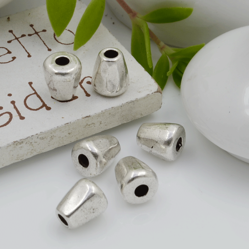 Distanziatori Perline liscio a forma di cilindro irregolare 6.5 x 7.5 mm 7 pz in metallo per bigiotteria per le tue creazioni!