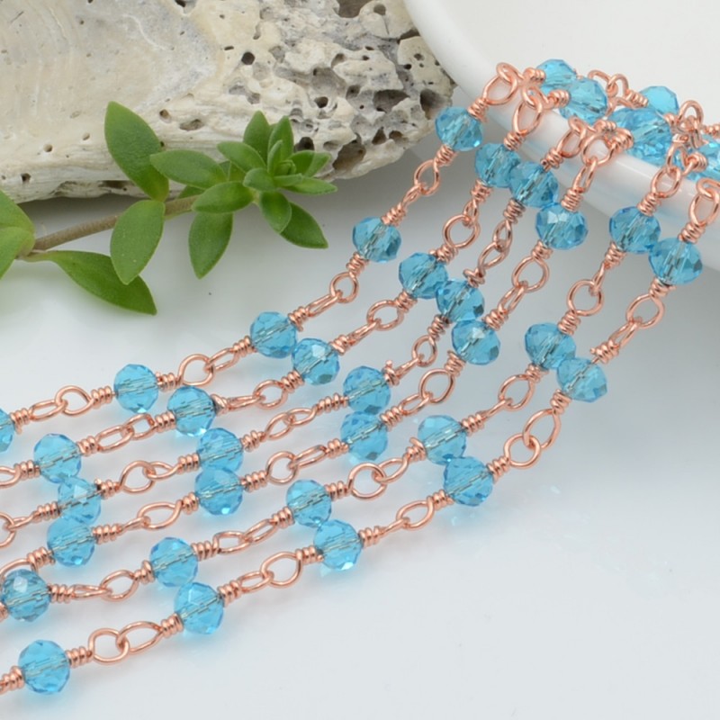 Catena rosario di cristalli colore azzurro trasparente da 4mm concatenati con filo oro rosa in ottone 50cm | GDO