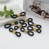 Gommini Terminali con molla in acciaio connettori per catenelle occhiali 4 x 20 mm 10 pz oro silicone nero