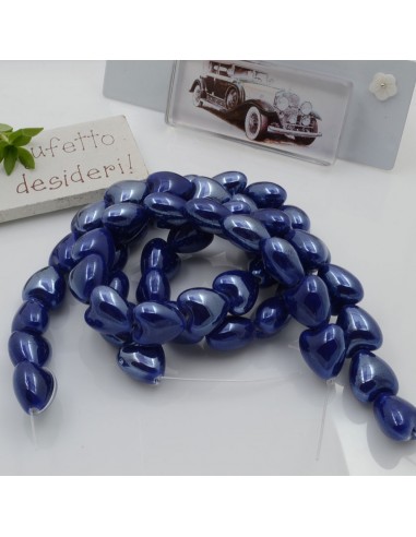 Perle cuore in ceramica colore bluette 12x13mm 1 filo 25pz GDO