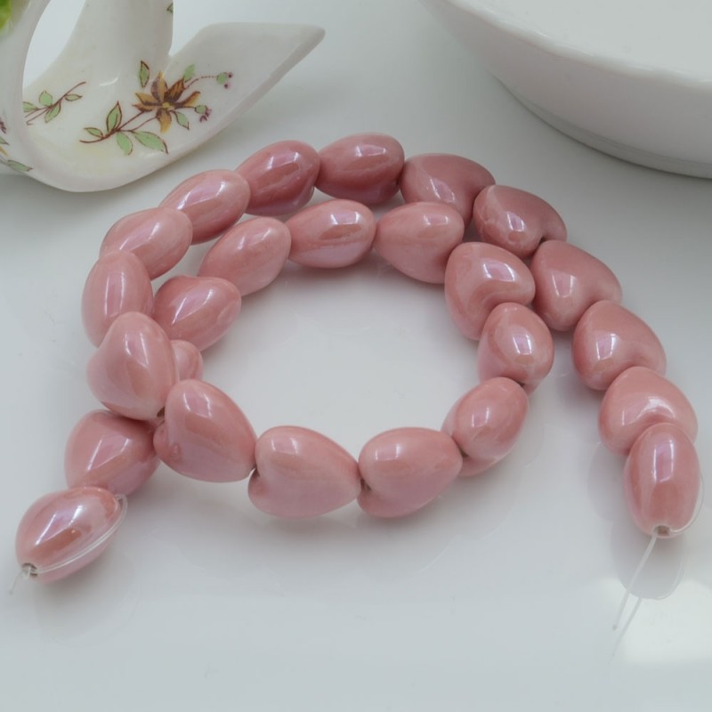 Perle cuore in ceramica colore rosa 12x13mm 1 filo 25pz GDO