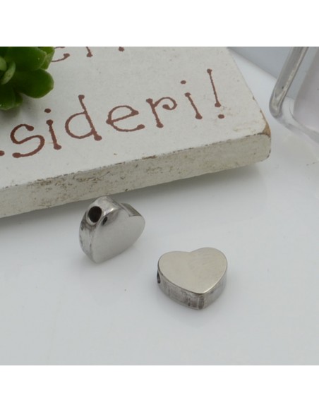 Distanziatore cuore piatto acciaio 7 x 8 mm foro 1.8 mm 1pz Gioie d'Oriente