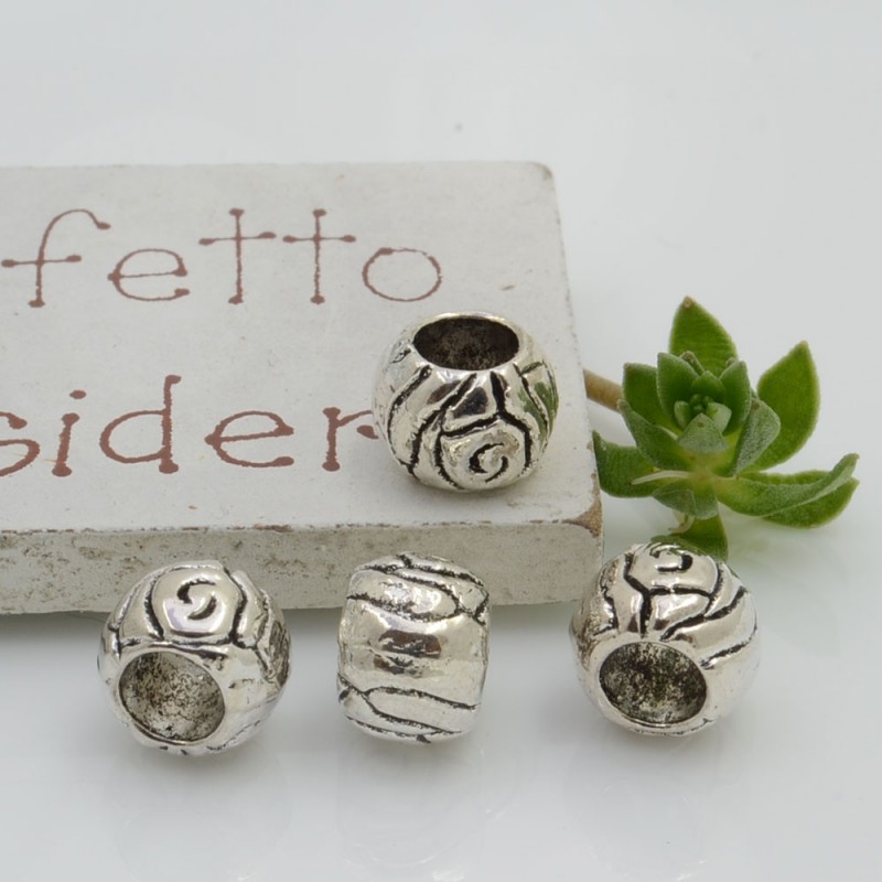Distanziatori foro largo con fantasia 6.5 x 8.5 mm 4 pz colore argento per bracciale collana per le tue creazioni!!