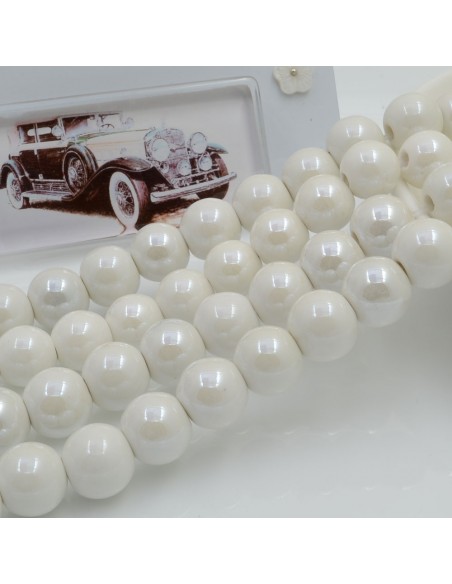 Filo di perle rotonde in ceramica smaltata 10 mm 33pz Gioie d'Oriente