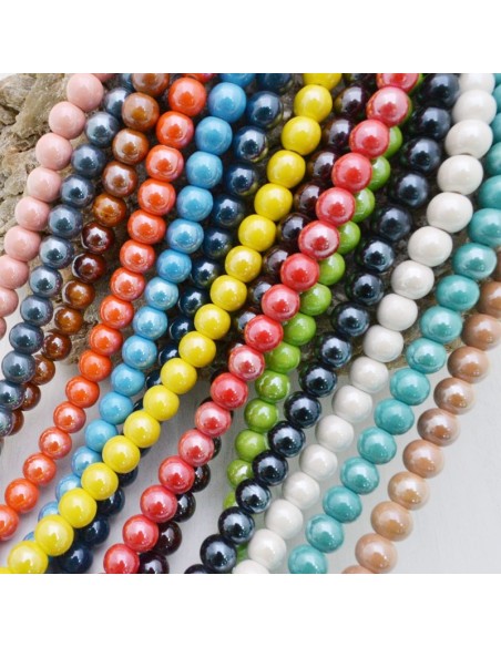 Filo di perle rotonde in ceramica smaltata 10 mm 33pz Gioie d'Oriente