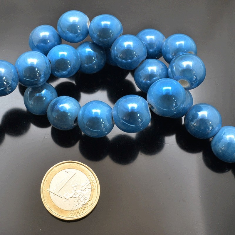 Filo di perle rotonde in ceramica smaltata 16-18 mm 22pz Gioie d'Oriente