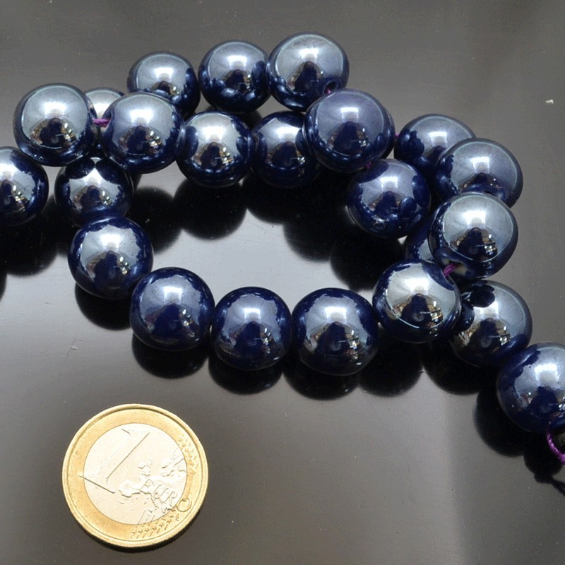 Filo di perle rotonde in ceramica smaltata 16-18 mm 22pz Gioie d'Oriente