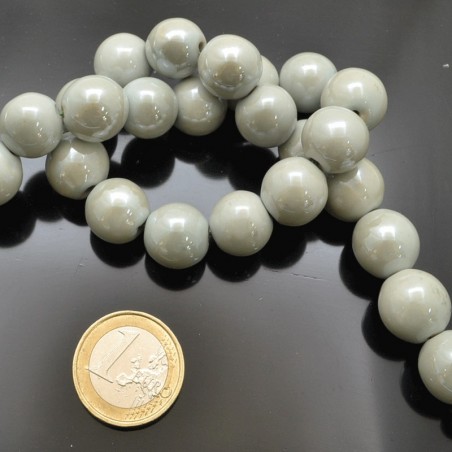 Filo di perle rotonde in ceramica smaltata 16-18 mm 22pz Gioie d'Oriente