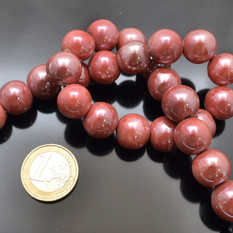 Filo di perle rotonde in ceramica smaltata 16-18 mm 22pz Gioie d'Oriente