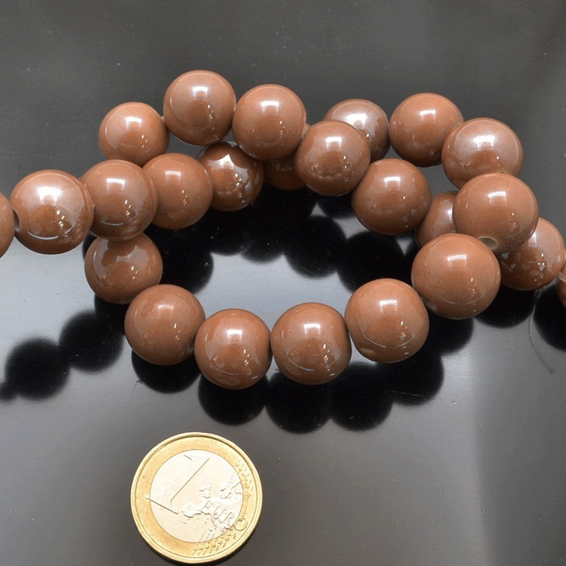 Filo di perle rotonde in ceramica smaltata 16-18 mm 22pz Gioie d'Oriente