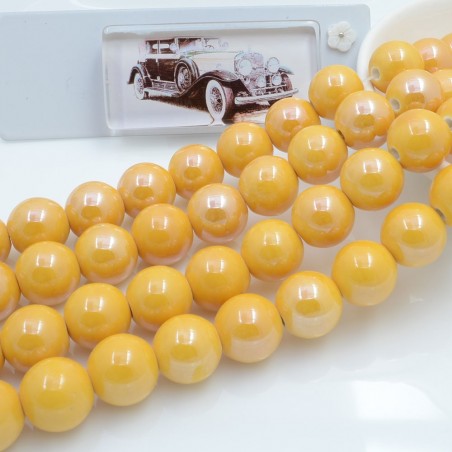Filo di perle rotonde in ceramica smaltata 16-18 mm 22pz Gioie d'Oriente