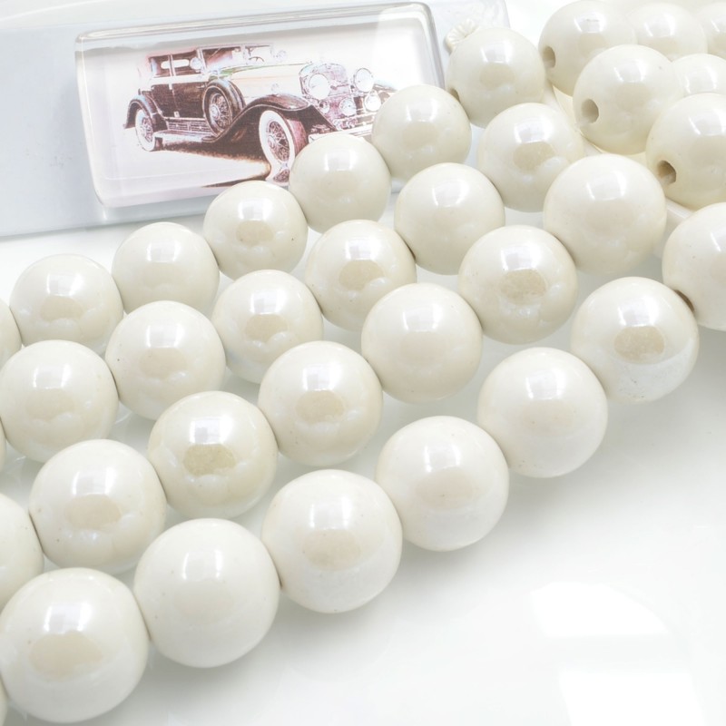 Filo di perle rotonde in ceramica smaltata 16-18 mm 22pz Gioie d'Oriente