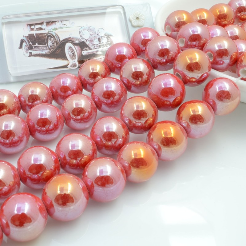 Filo di perle rotonde in ceramica smaltata 16-18 mm 22pz Gioie d'Oriente
