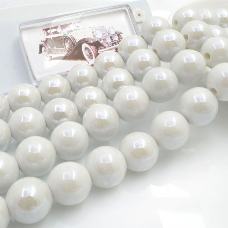 Filo di perle rotonde in ceramica smaltata 16-18 mm 22pz Gioie d'Oriente