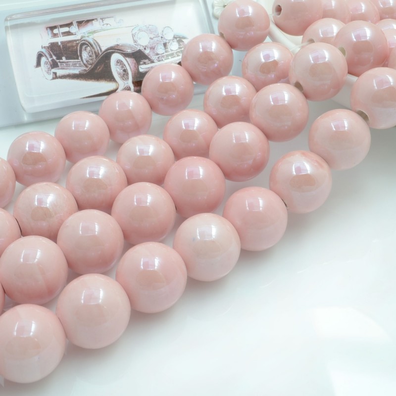 Filo di perle rotonde in ceramica smaltata 16-18 mm 22pz Gioie d'Oriente