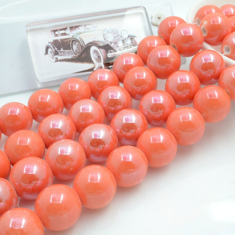 Filo di perle rotonde in ceramica smaltata 16-18 mm 22pz Gioie d'Oriente