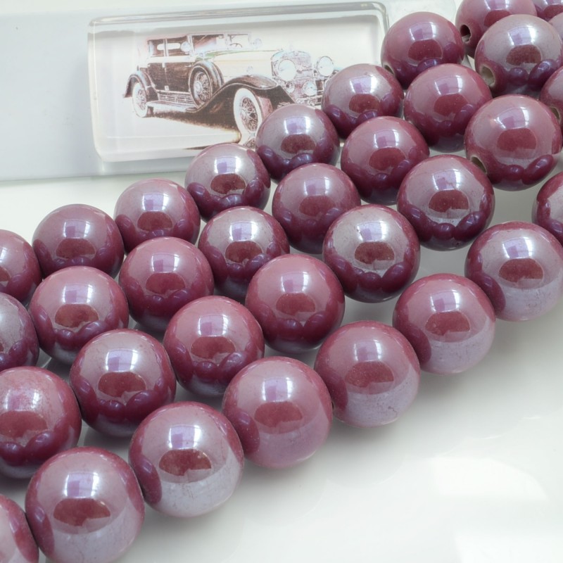 Filo di perle rotonde in ceramica smaltata 16-18 mm 22pz Gioie d'Oriente
