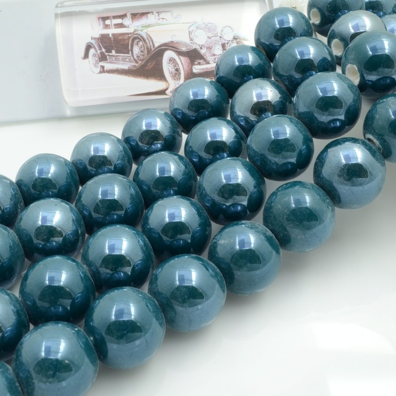 Filo di perle rotonde in ceramica smaltata 16-18 mm 22pz Gioie d'Oriente