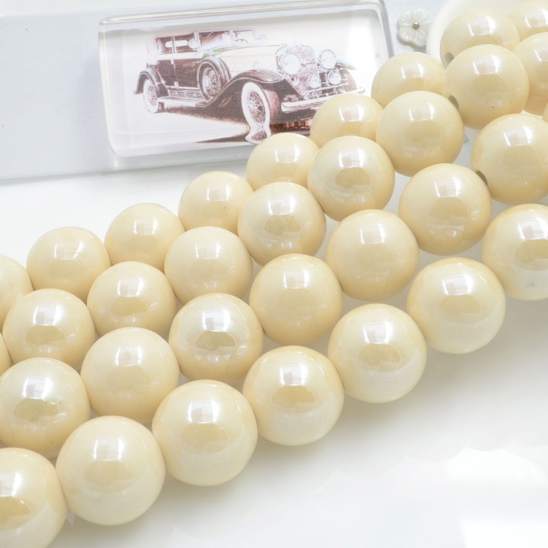 Filo di perle rotonde in ceramica smaltata 16-18 mm 22pz Gioie d'Oriente