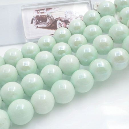 Filo di perle rotonde in ceramica smaltata 16-18 mm 22pz Gioie d'Oriente