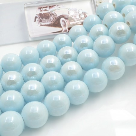 Filo di perle rotonde in ceramica smaltata 16-18 mm 22pz Gioie d'Oriente