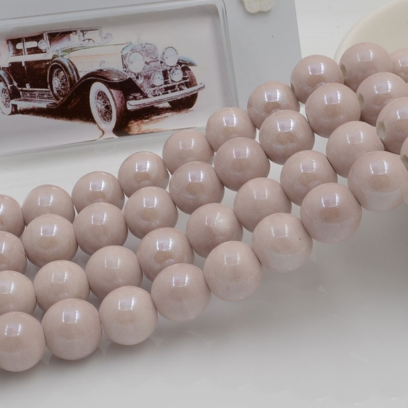 Filo di perle rotonde in ceramica smaltata 16-18 mm 22pz Gioie d'Oriente