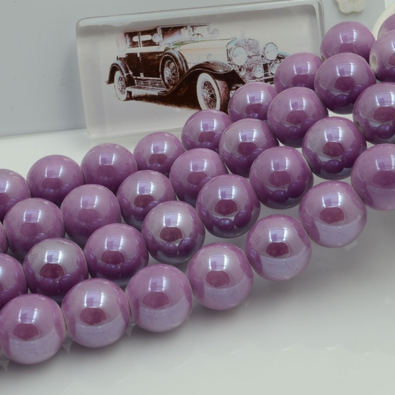 Filo di perle rotonde in ceramica smaltata 16-18 mm 22pz Gioie d'Oriente