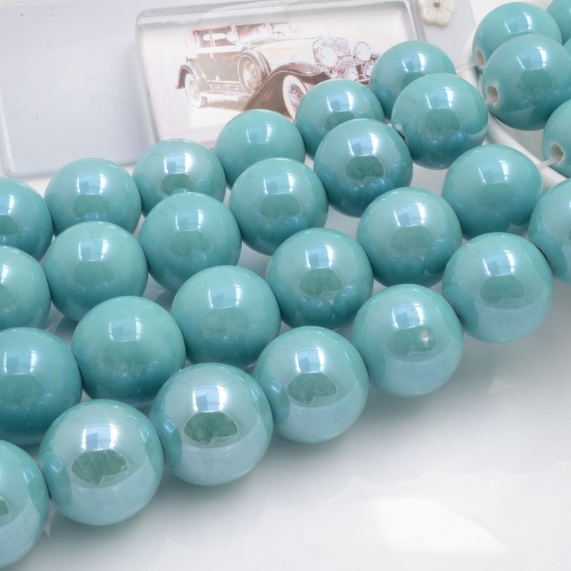 Filo di perle rotonde in ceramica smaltata 16-18 mm 22pz Gioie d'Oriente