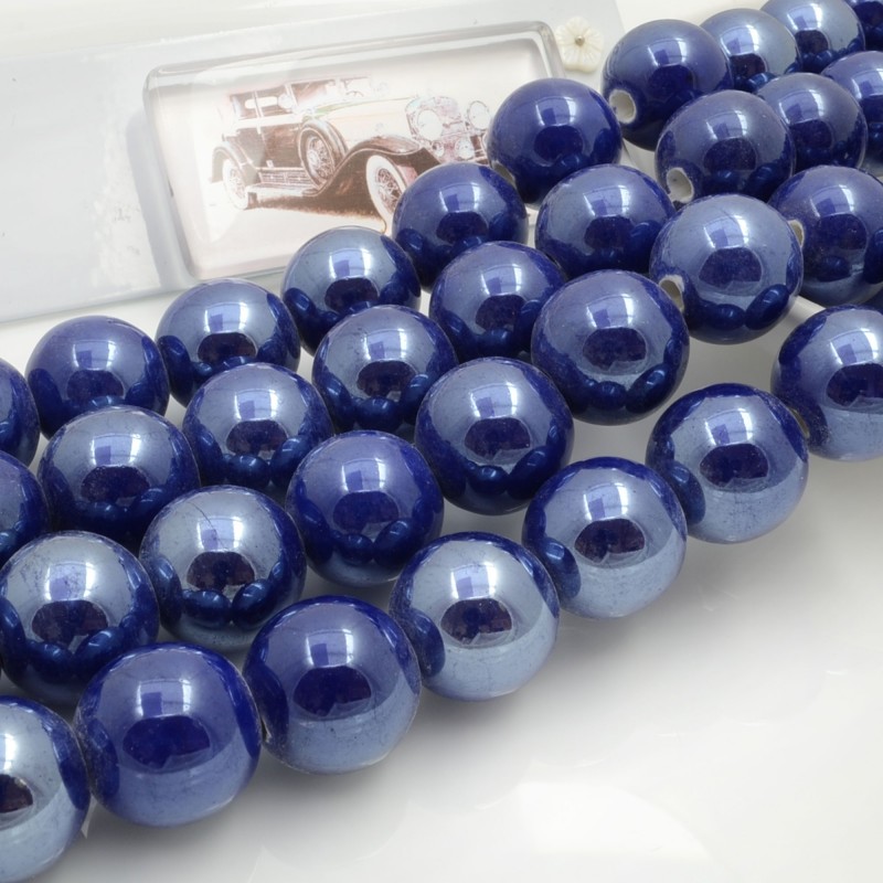 Filo di perle rotonde in ceramica smaltata 16-18 mm 22pz Gioie d'Oriente