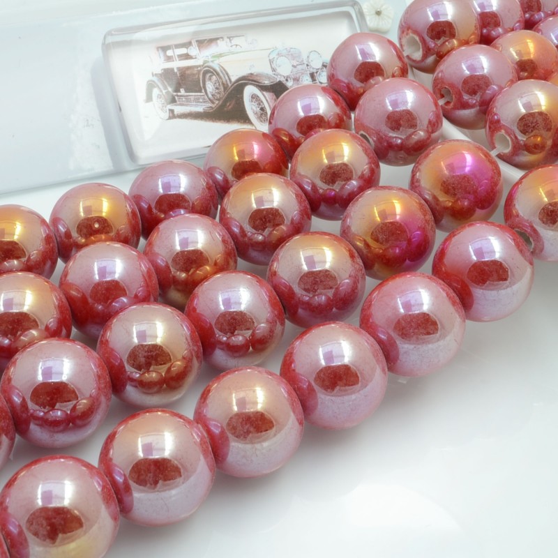 Filo di perle rotonde in ceramica smaltata 16-18 mm 22pz Gioie d'Oriente