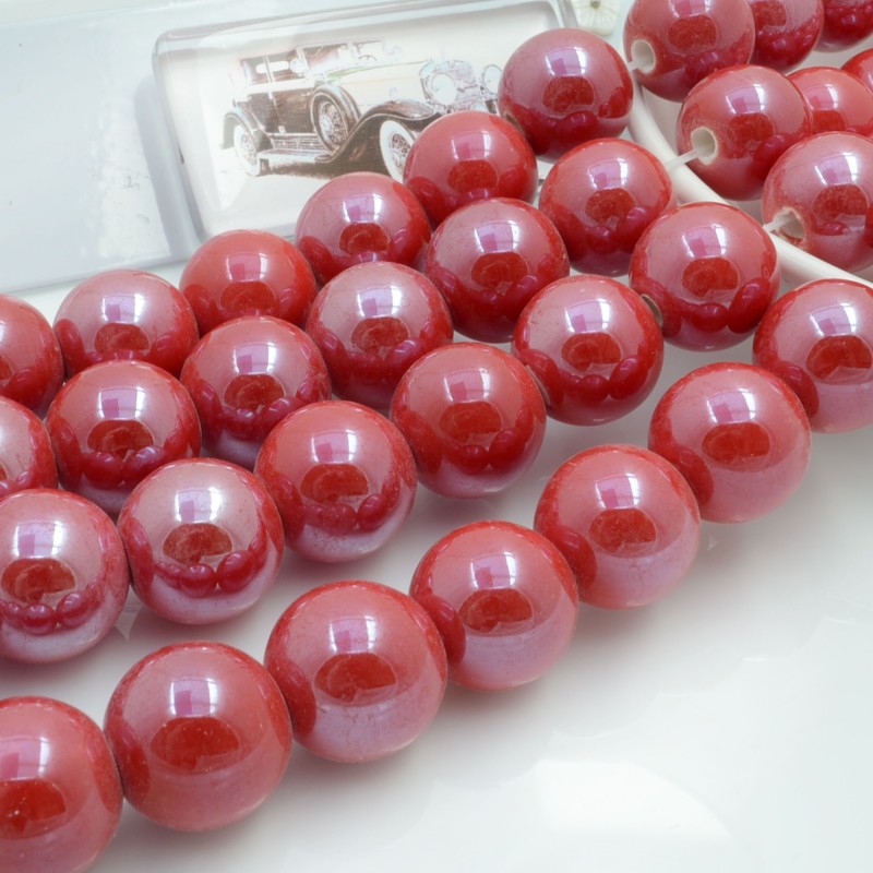 Filo di perle rotonde in ceramica smaltata 16-18 mm 22pz Gioie d'Oriente