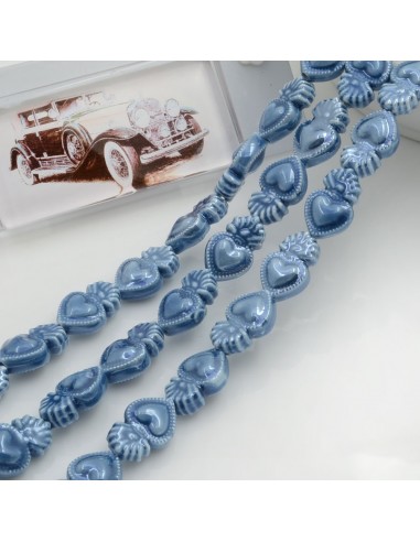 Filo perle a forma di cuore sacro in ceramica luminosa e smaltata colore avio 16 x 10 mm 20 pz per le tue creazioni!!