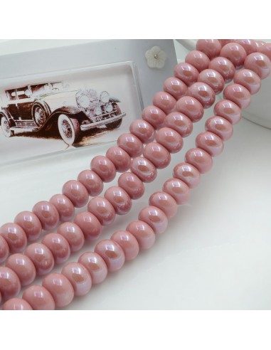 Filo di rondelle tonde in ceramica color rosa scuro 9x6mm 40pz