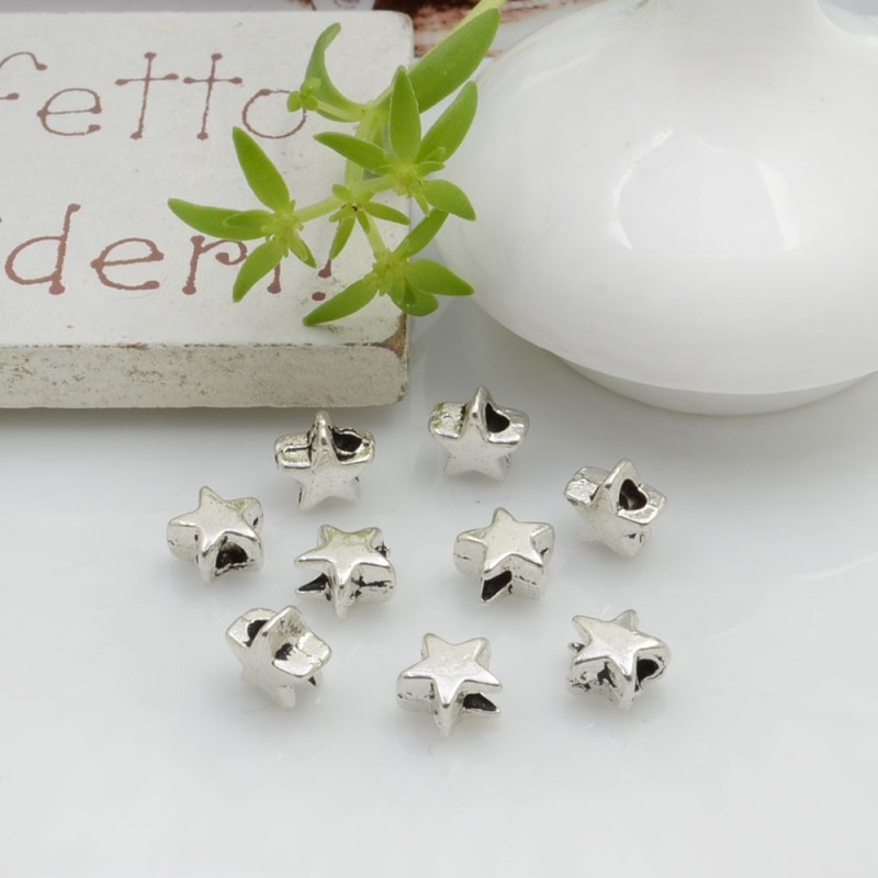 Distanziatori Perline piatto colore argento 5.5 mm 35 pz a forma di stella in metallo per bigiotteria per le tue creazioni!