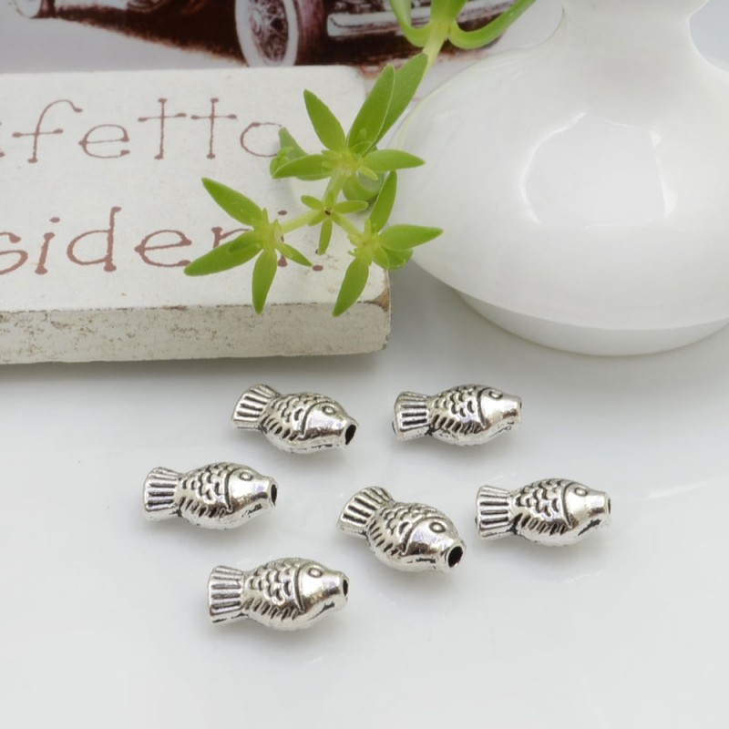 Distanziatori Perline piatto colore argento 9 x 5 mm 18 pz a forma di pesciolino in metallo per l tue creazioni!