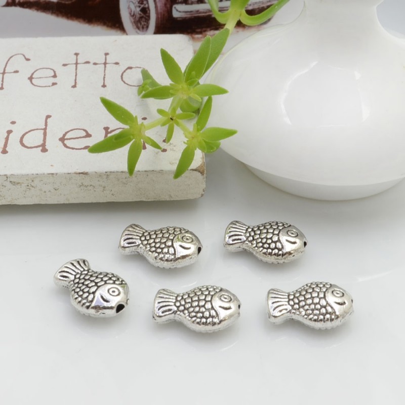 Distanziatori Perline piatto colore argento 10 x 7 mm 12 pz a forma di pesce in metallo per bigiotteria per le tue creazioni!