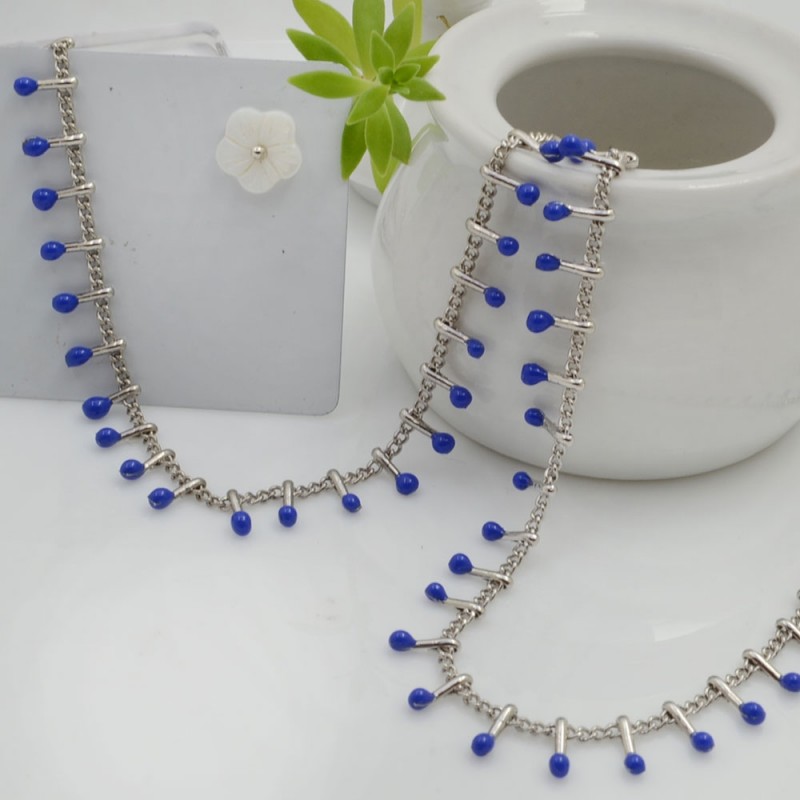 Catena in acciaio groumetta argento piatta forma gocce smaltate bluette altezza 0.6 mm confezione 50 cm