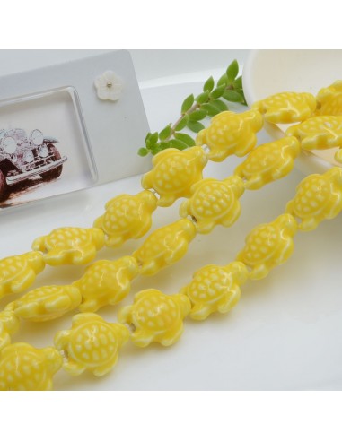 Filo perle a forma di tartaruga bombata in ceramica luminosa e smaltata colore giallo 19 x 15 mm 20 pz cod 024