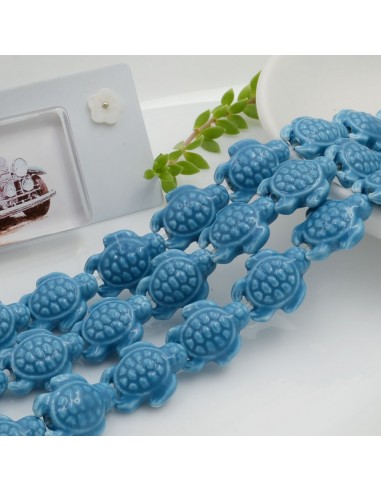 Filo perle a forma di tartaruga bombata in ceramica luminosa e smaltata colore azzurro scuro 19 x 15 mm 20 pz cod 031
