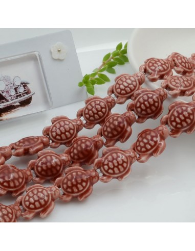 Filo perle a forma di tartaruga bombata in ceramica luminosa e smaltata colore marrone chiaro 19 x 15 mm 20 pz cod 035